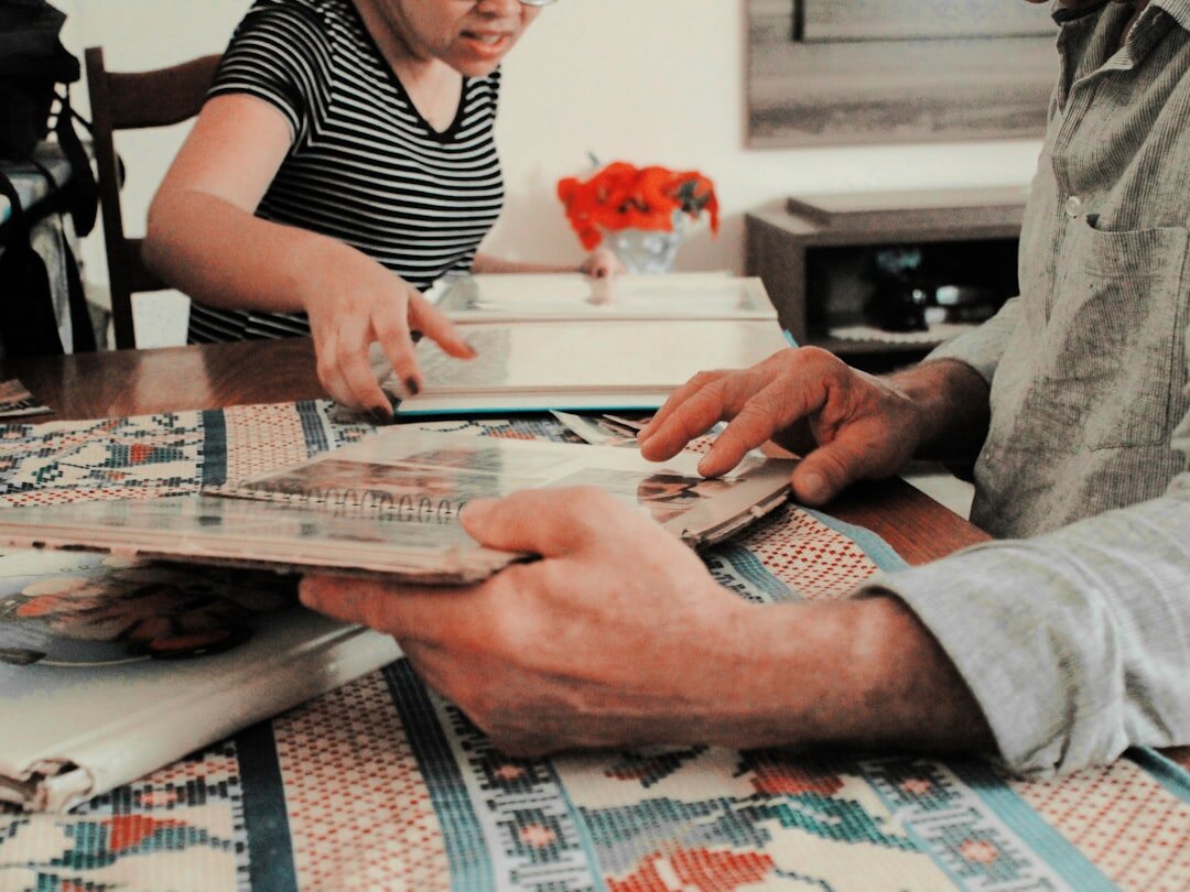 Turkish family gathered around a table reviewing inheritance documents